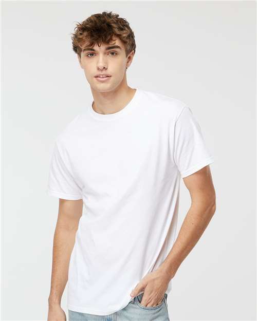 Model wearing Men's Cotton T-Shirt - Premium Comfort Style in white, front angle. Soft cotton tee styled for modern casual looks.