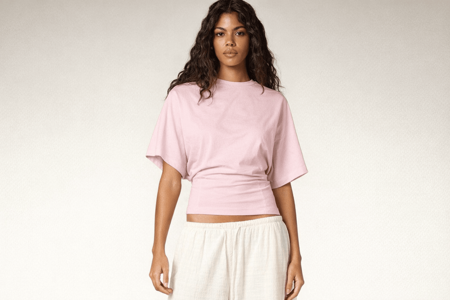 IdyllVie Relaxed Batwing Cotton Tee in Pink t-shirt foundation on-model front angled with refined IdyllVie styling