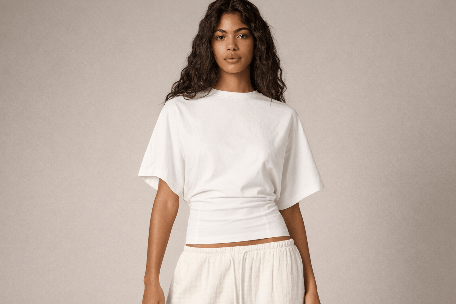 IdyllVie Relaxed Batwing Cotton Tee in White t-shirt foundation on-model front angled with refined IdyllVie styling