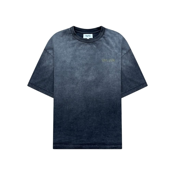 Front view of the 101 IdyllVie Studio Tee, a heavyweight cotton t-shirt with a vintage washed black finish and minimalist chest logo.