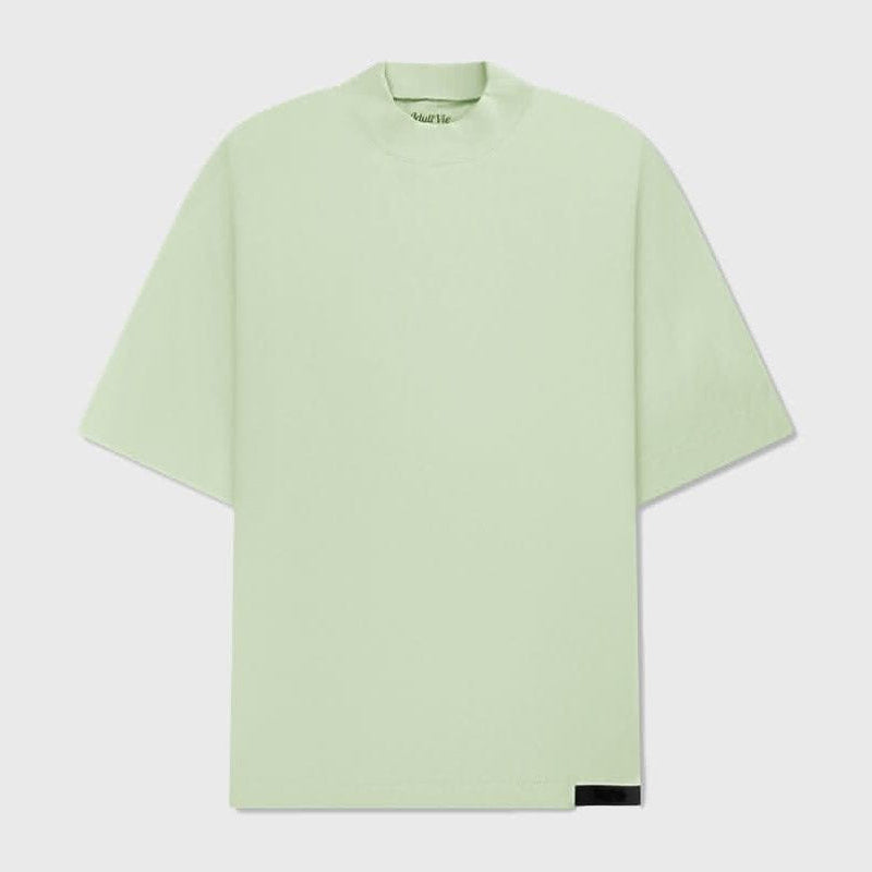 Green mock neck T-shirt in sage cotton with short sleeves and relaxed fit, ideal for casual wear and versatile styling.