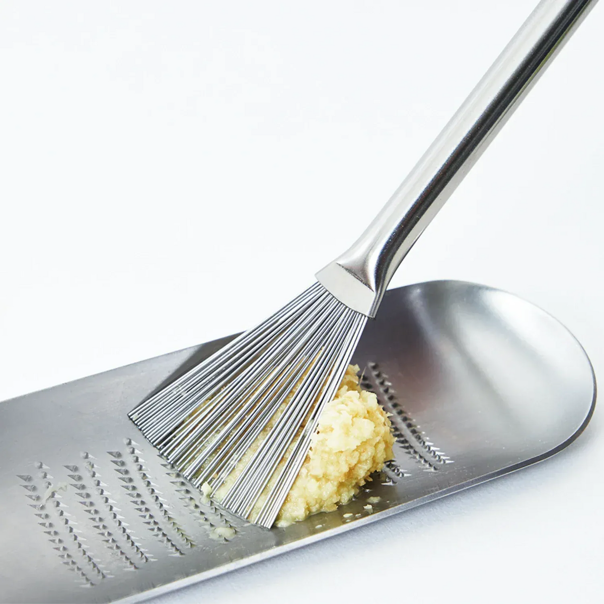 Eatoco Hake Grater Brush – Japanese Stainless Steel Grater Cleaner in stainless steel, front product view showing cookware shape, material, and