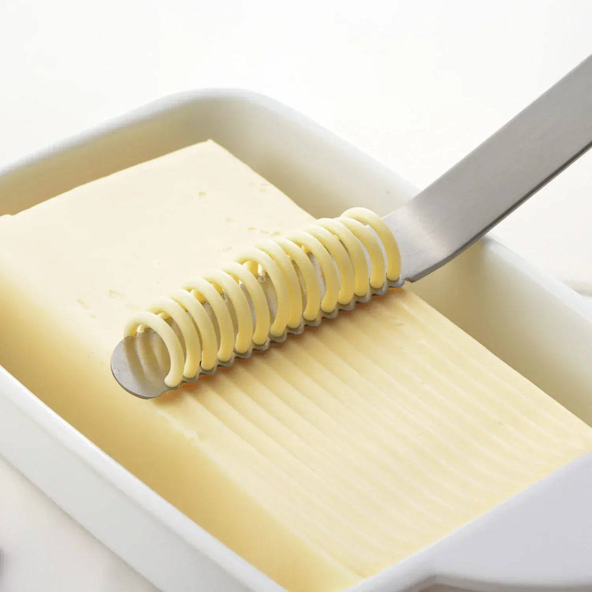 Eatoco Nulu Butter Knife – Japanese Stainless-Steel Butter Curler & Spreader in stainless steel, front product view showing cookware shape