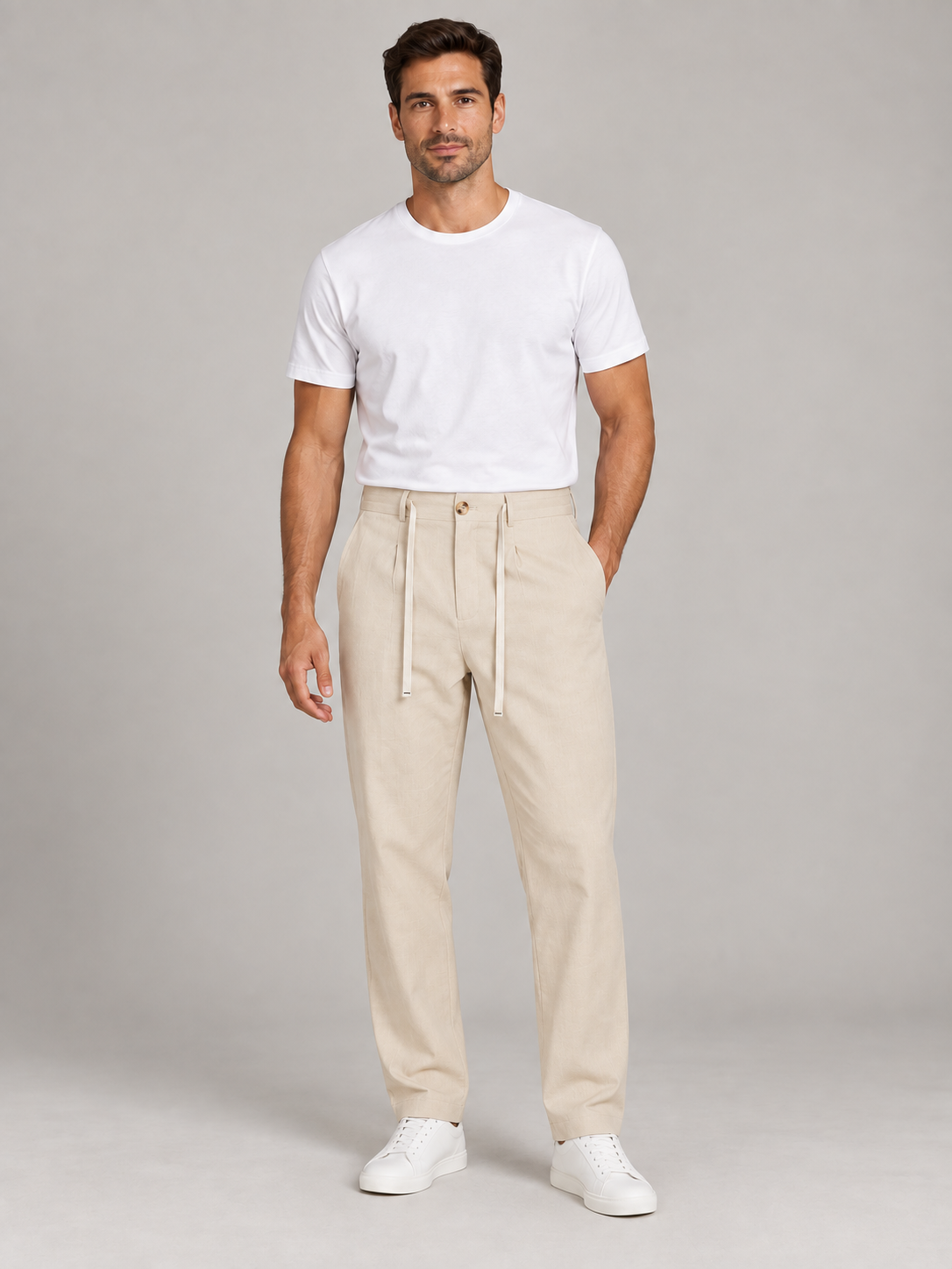 Apricot button-front drawstring trousers, front view on a model.