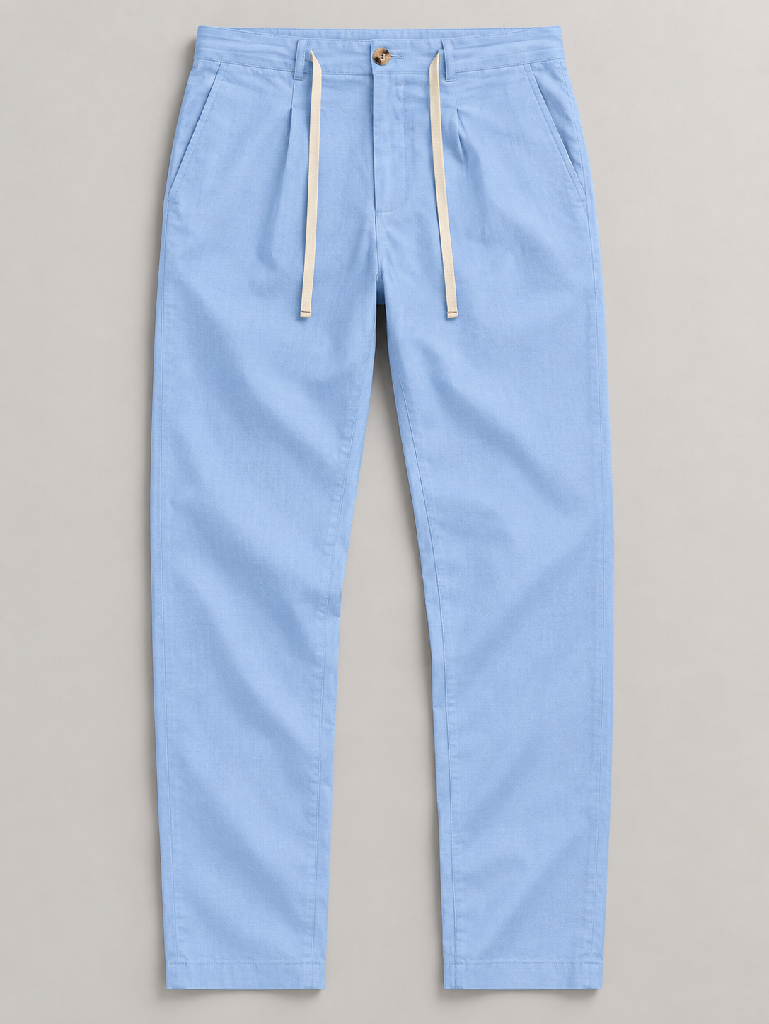 Baby Blue button-front drawstring trousers, flat lay front.