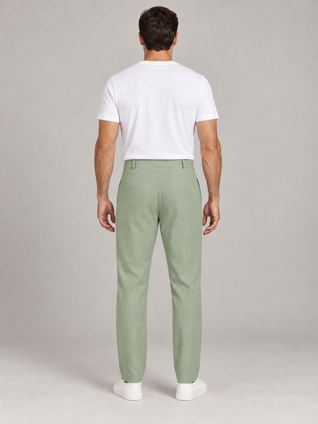 Green drawstring trousers, plain back view on a model.