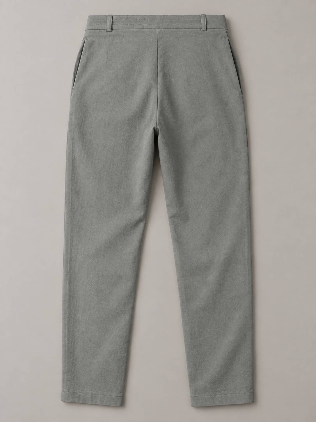Grey drawstring trousers, flat back with two belt loops and plain hems.