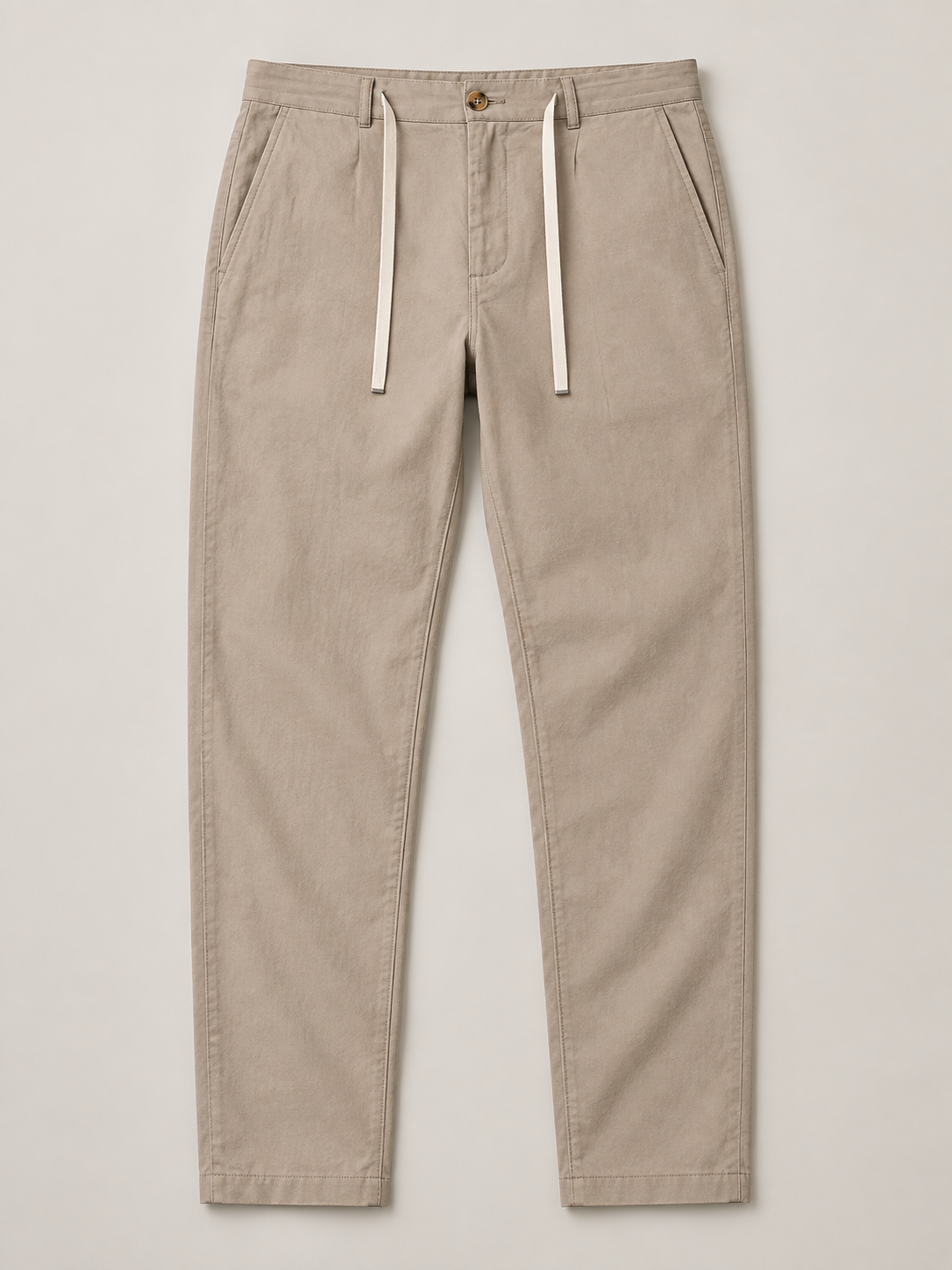 Khaki cotton button-front drawstring trousers, flat lay front.
