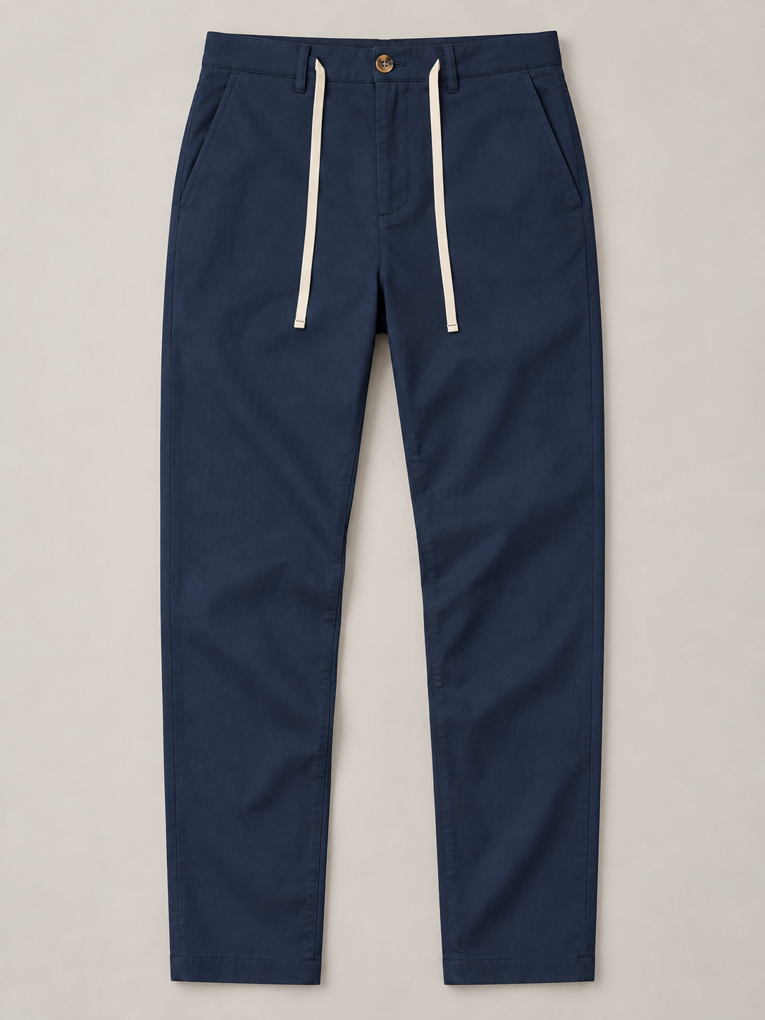 Navy Blue button-front drawstring trousers, flat lay front.