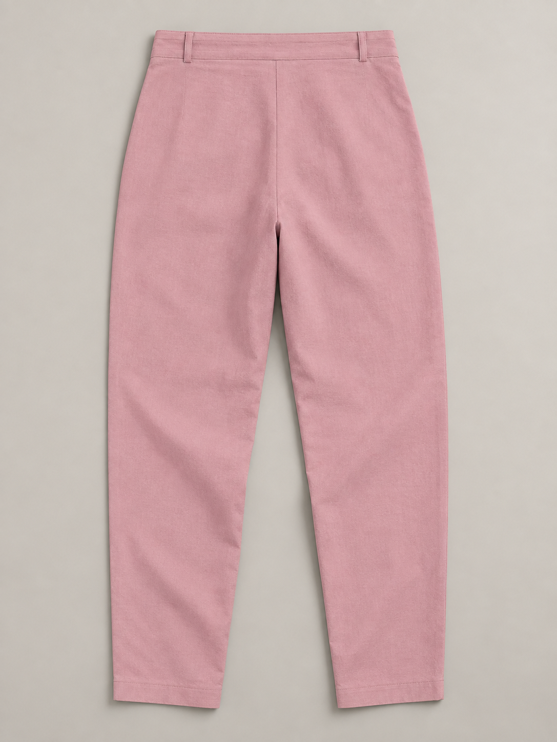 Pink button-front drawstring trousers, flat lay back.