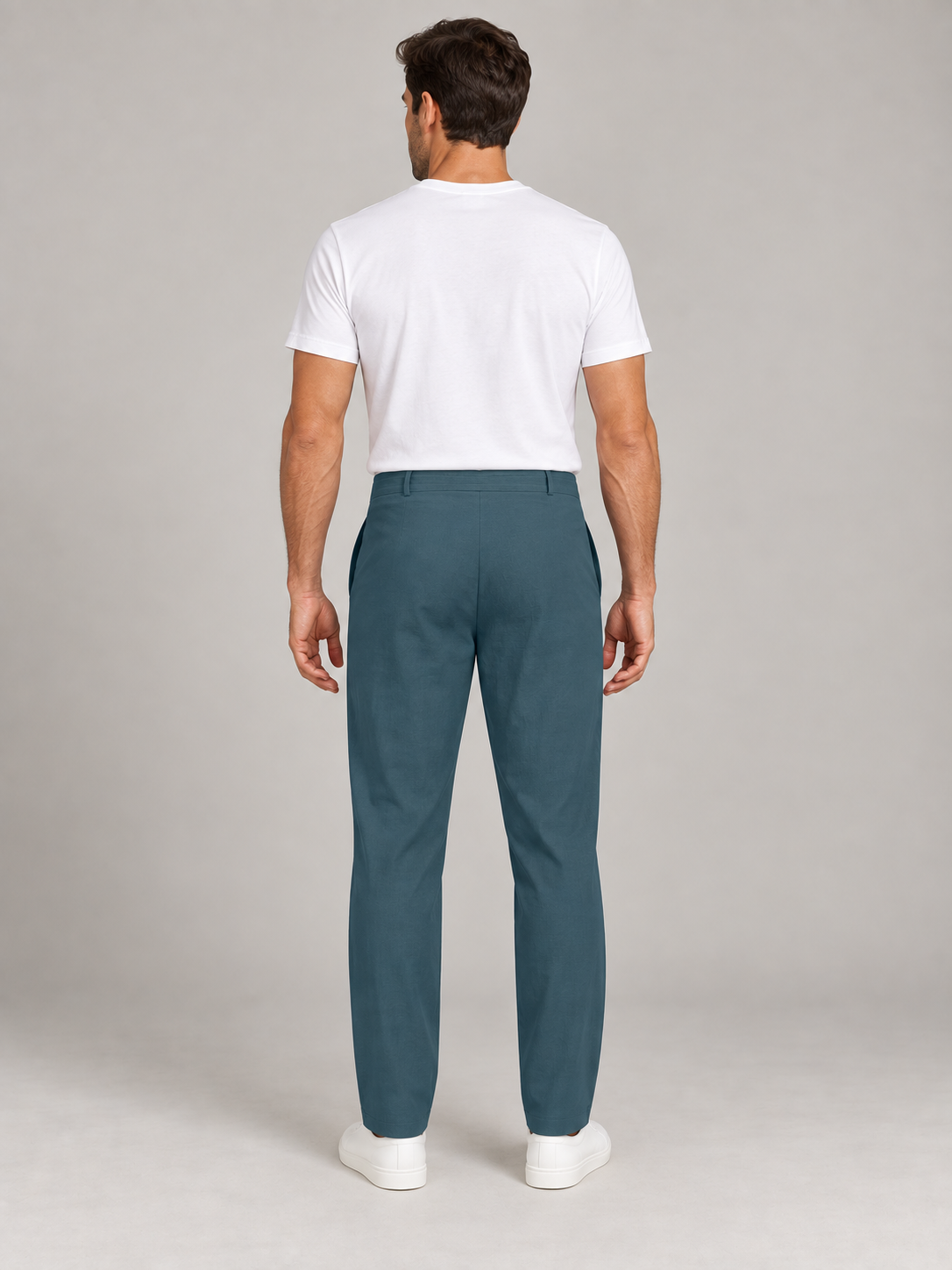 Teal Blue drawstring trousers, plain back view on a model.