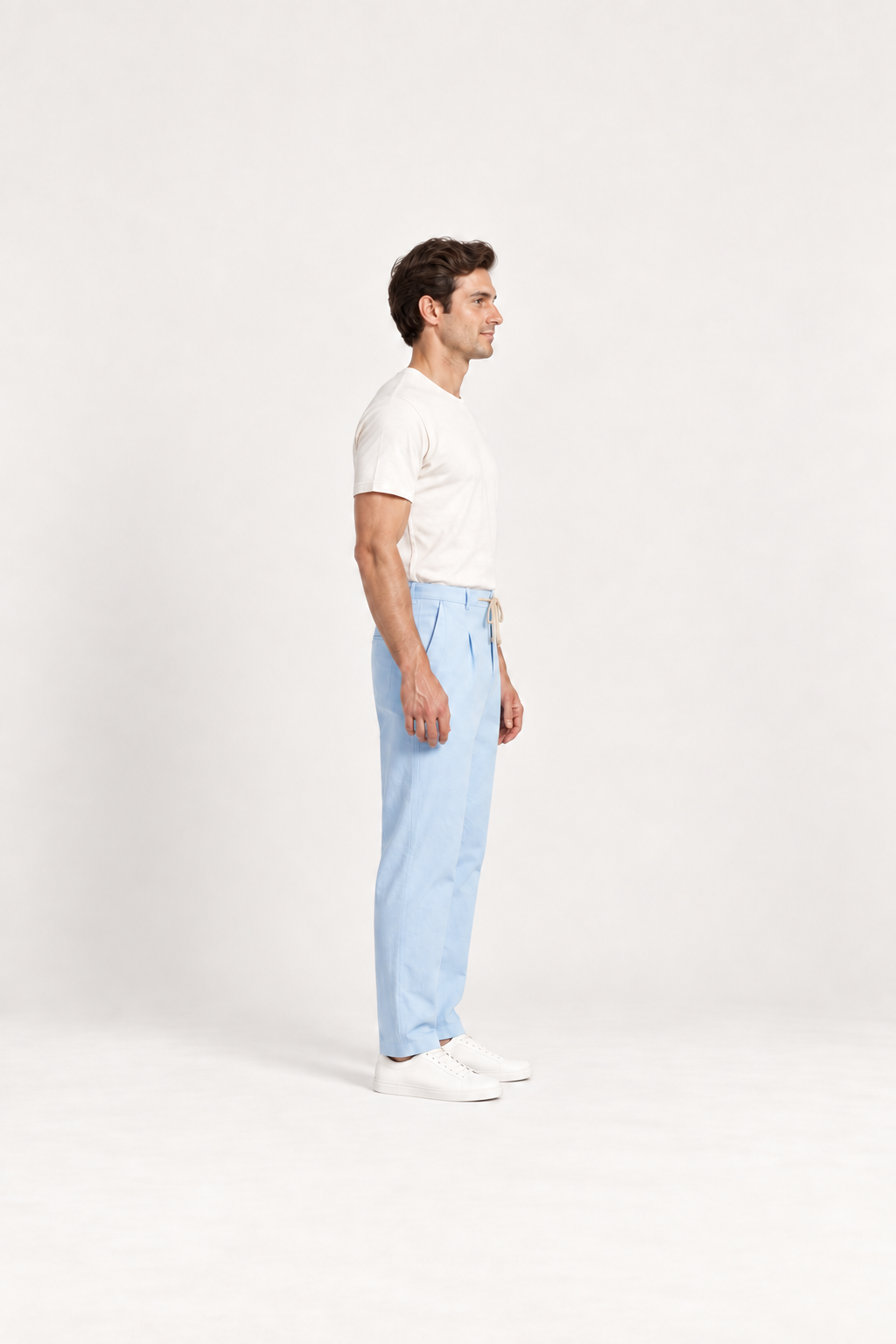 Baby Blue cotton pleated drawstring pants, side view on an adult model.