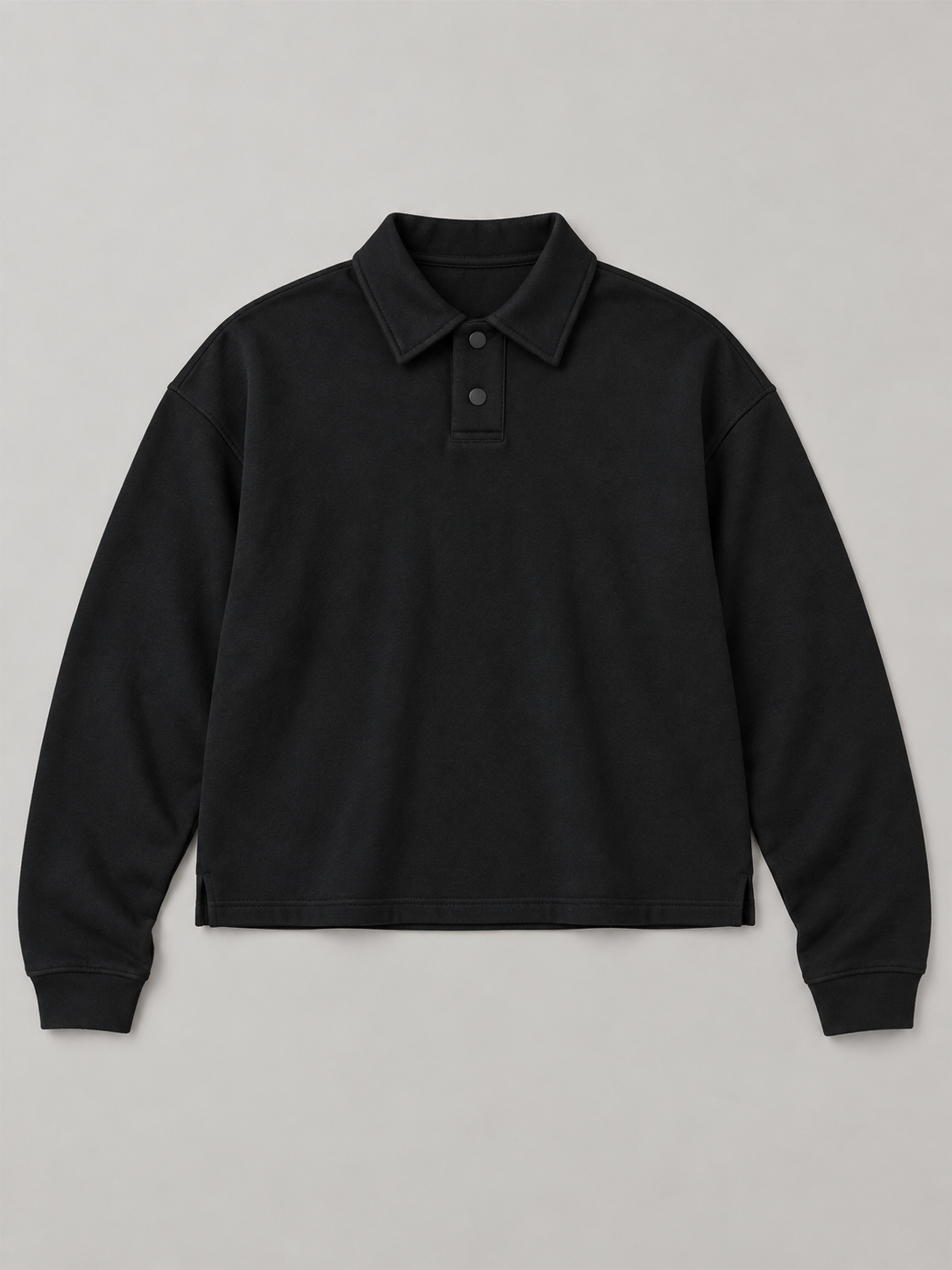 Black cotton polo pullover, flat front with two-snap placket.