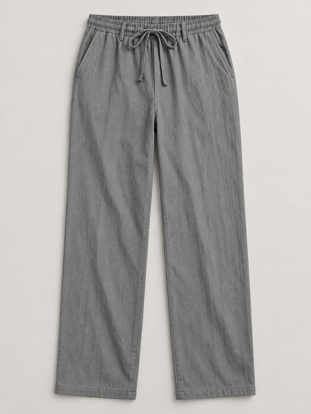 Dark Grey woven drawstring trousers, flat front with drawstring waist and side pockets.