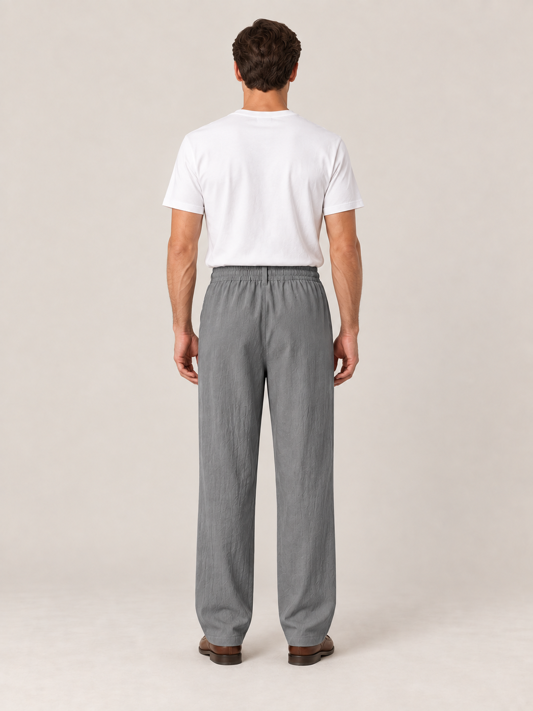 Dark Grey woven drawstring trousers, back view on a model.