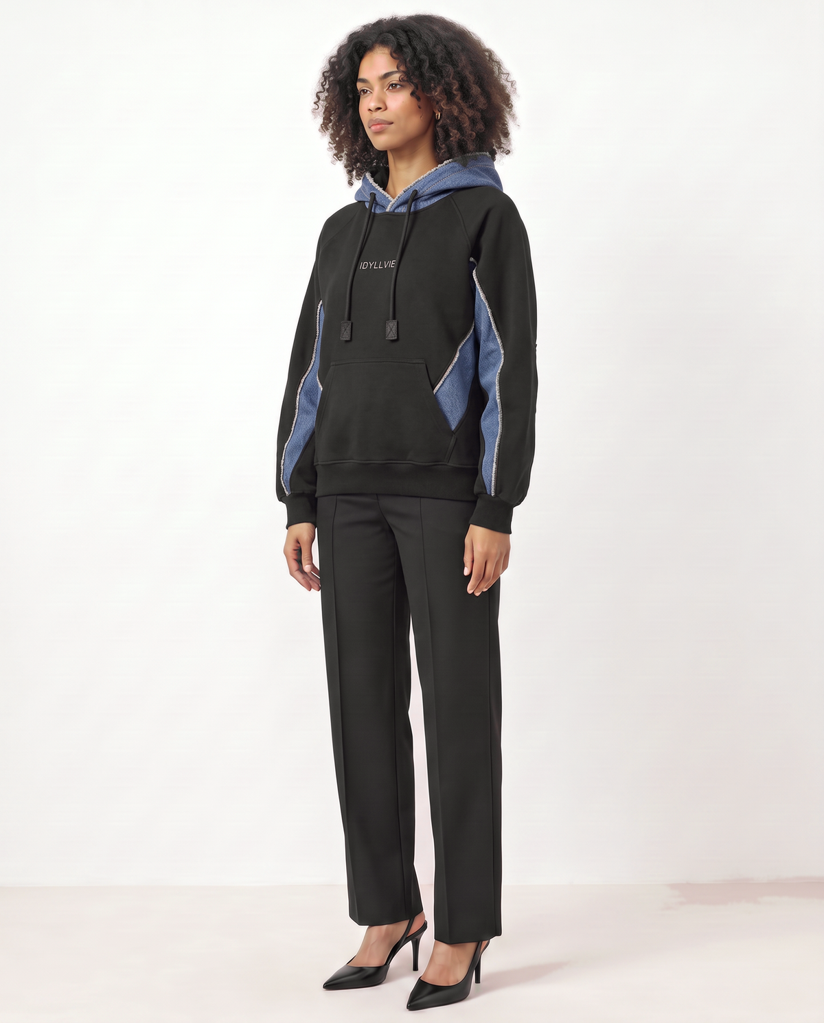 Hutton Denim Panelled Hoodie — female model three-quarter