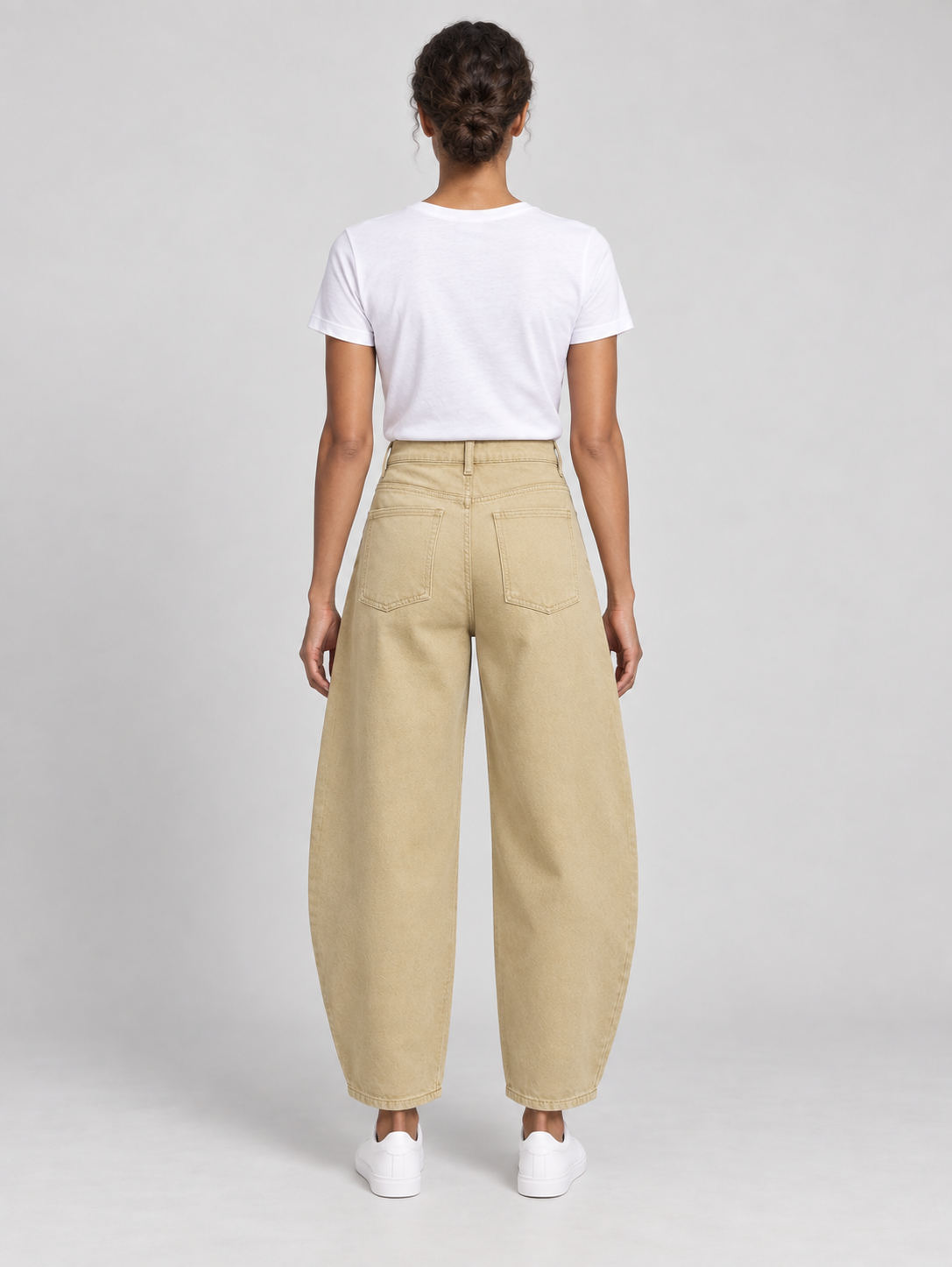 Khaki cotton barrel-leg jeans, back view on a model.