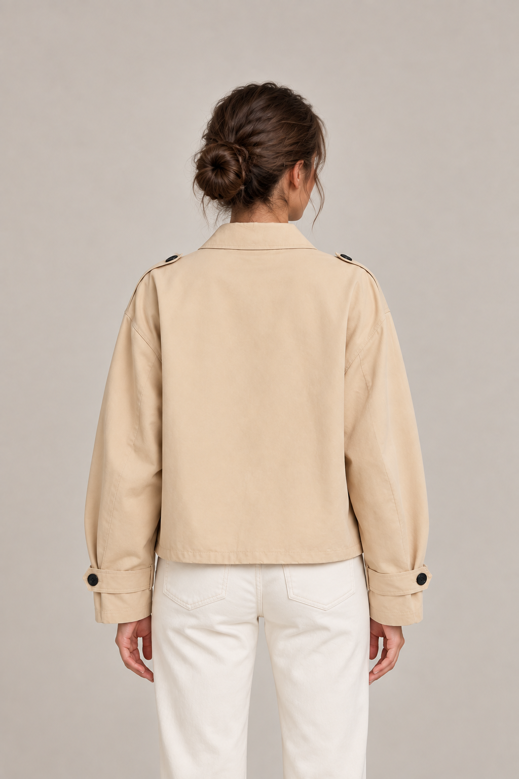 Camel cotton buckle-collar jacket, back on a model with collar folded down.