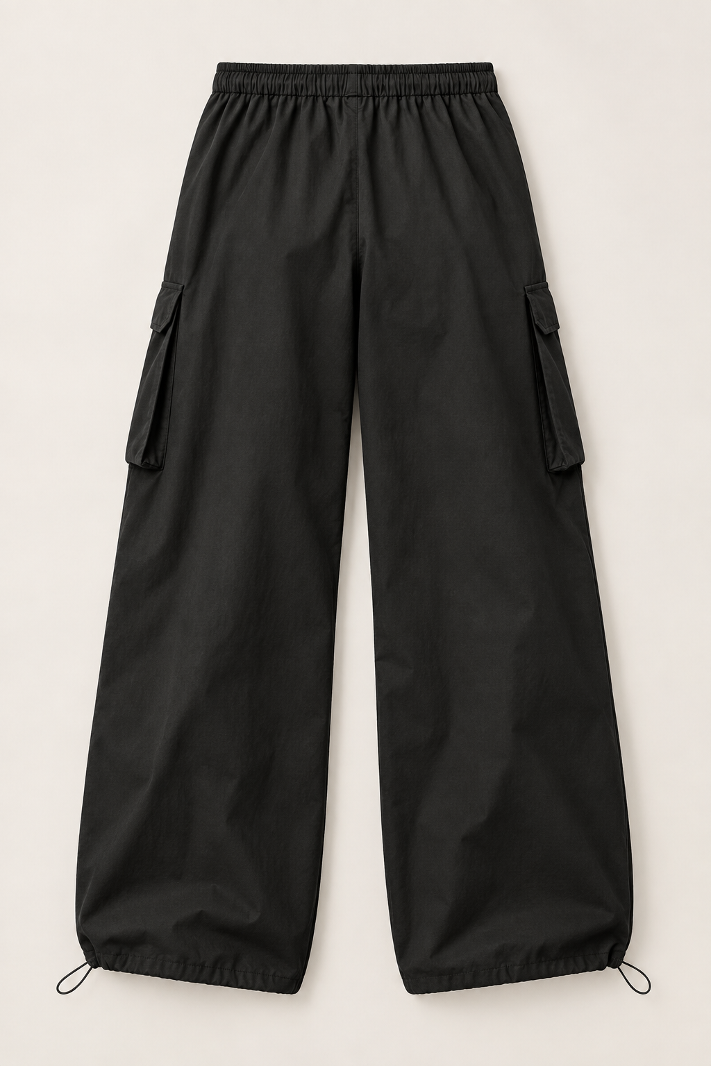 Black cotton drawstring cargo pants, flat lay back.