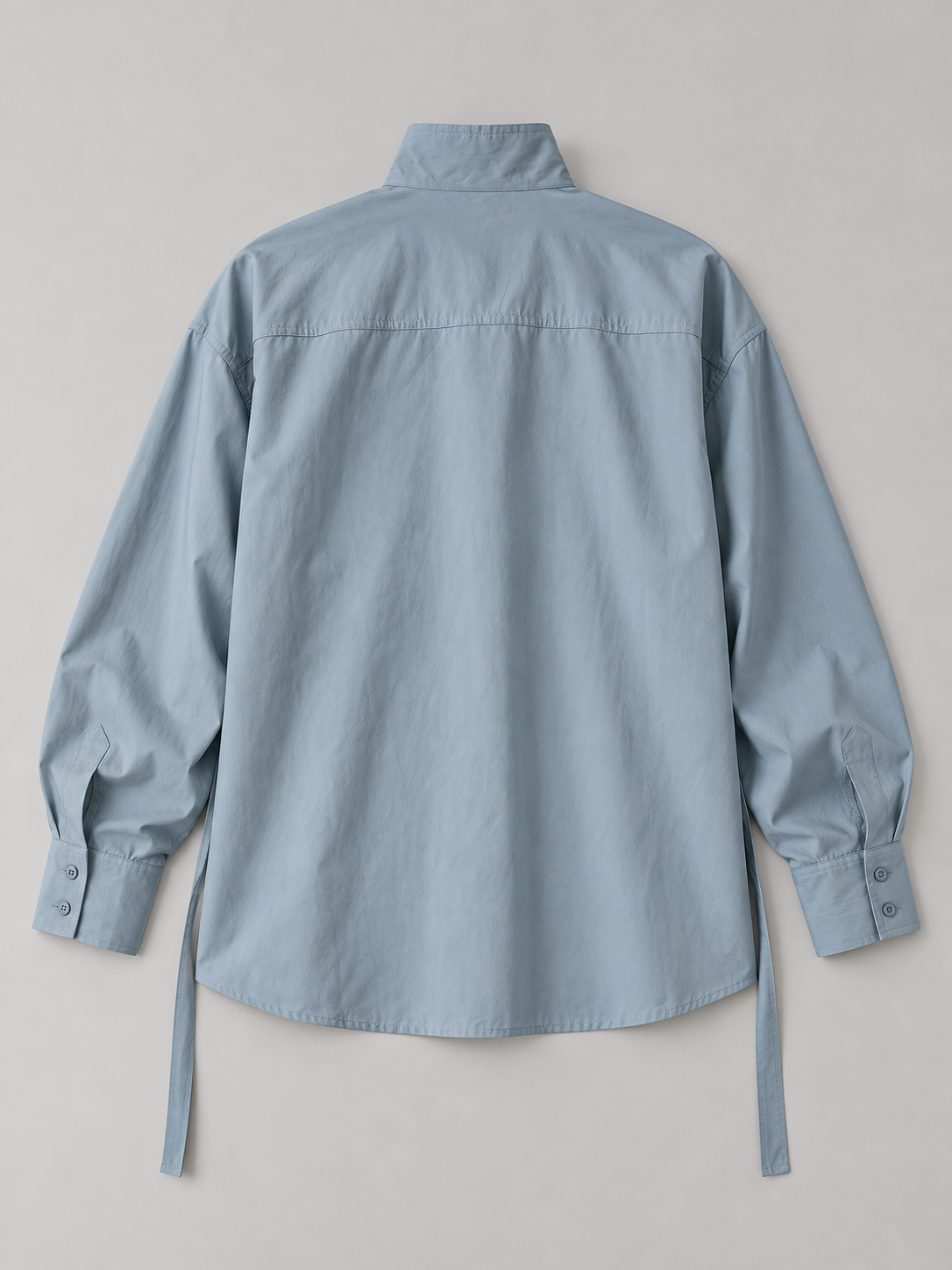 Blue stand-collar tie-waist shirt, flat lay back.