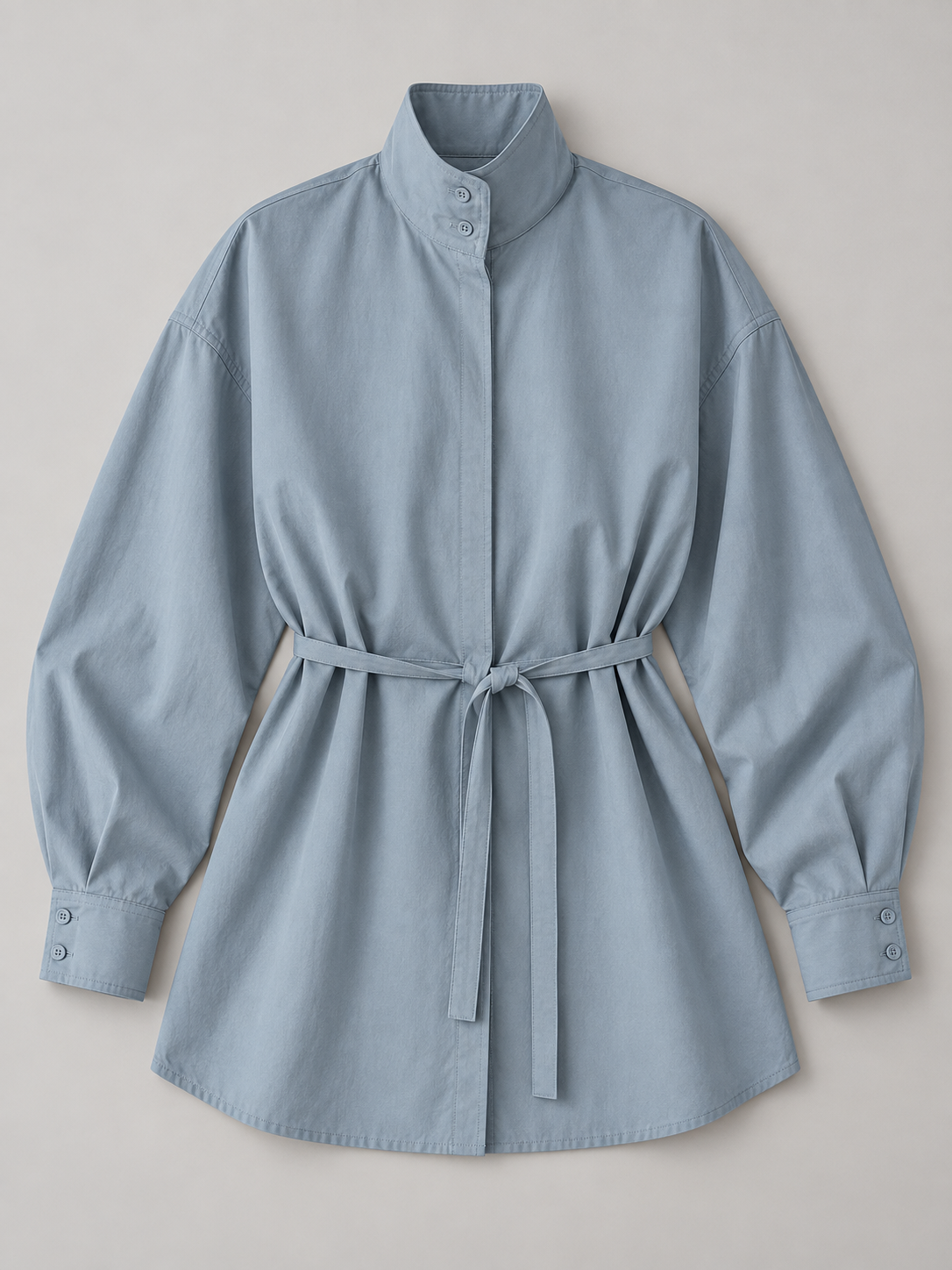 Blue stand-collar tie-waist shirt, flat lay front.