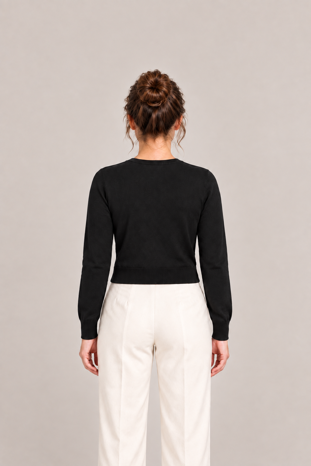 Black Petite cotton V-neck cardigan on a model, back view.