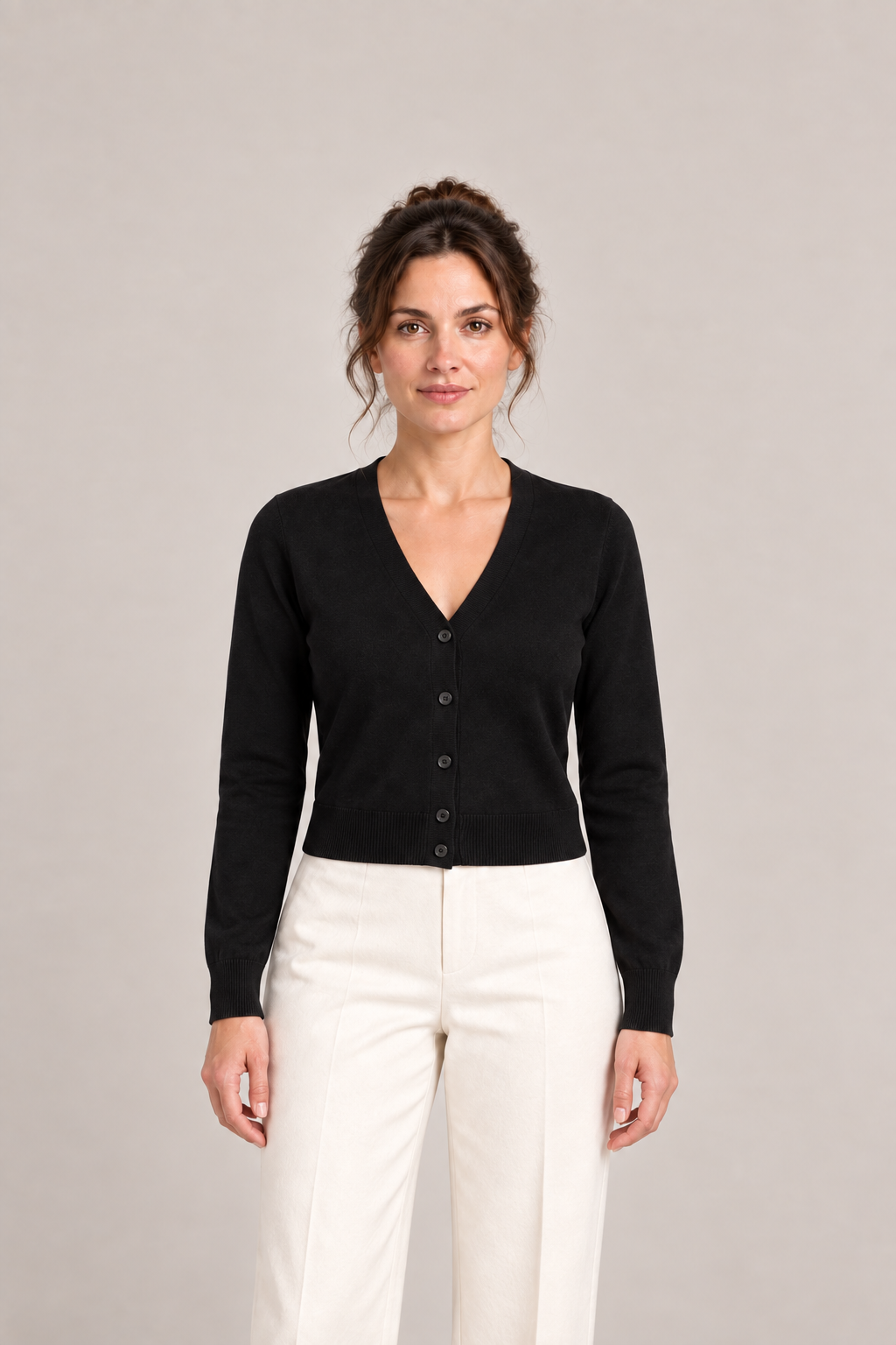 Black Petite cotton V-neck cardigan on a model, front view.