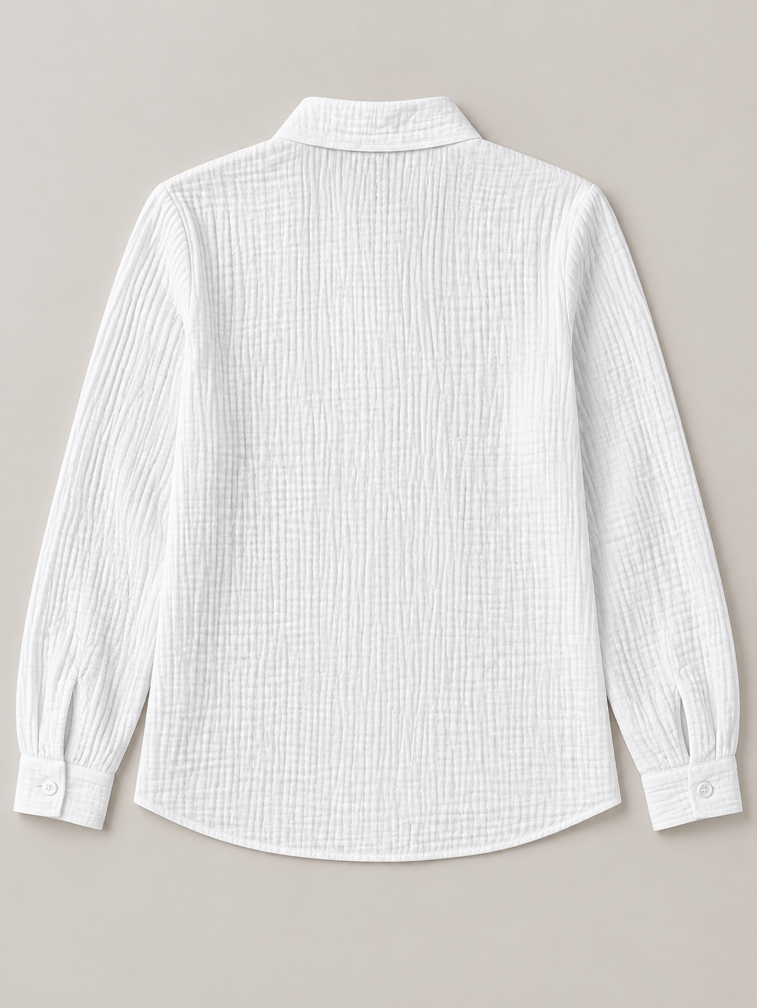 White crinkled cotton blouse with scarf neck ties, flat lay back.