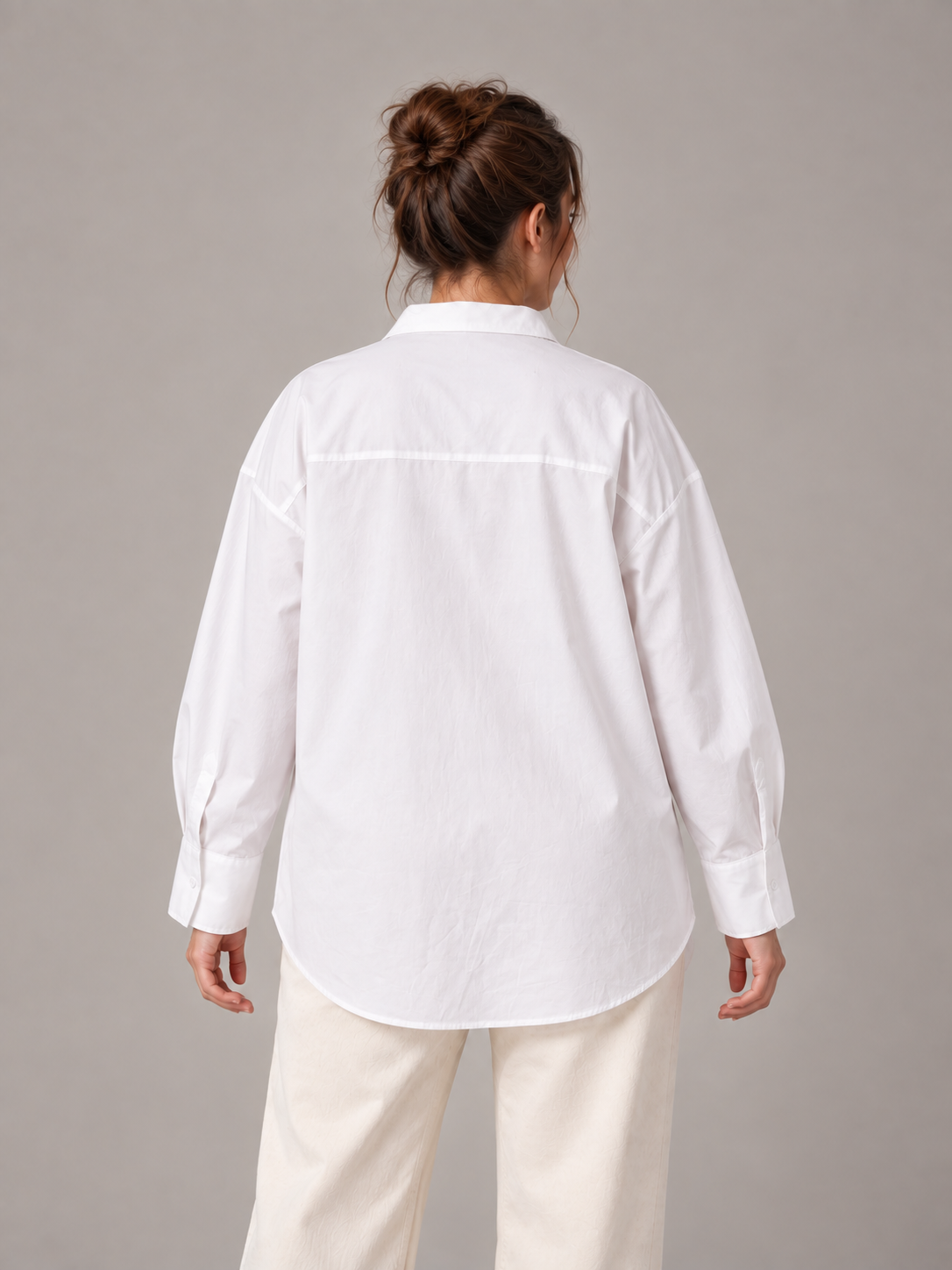 White Curve button-up shirt on an adult model, back view; Curve size range 0XL–4XL.
