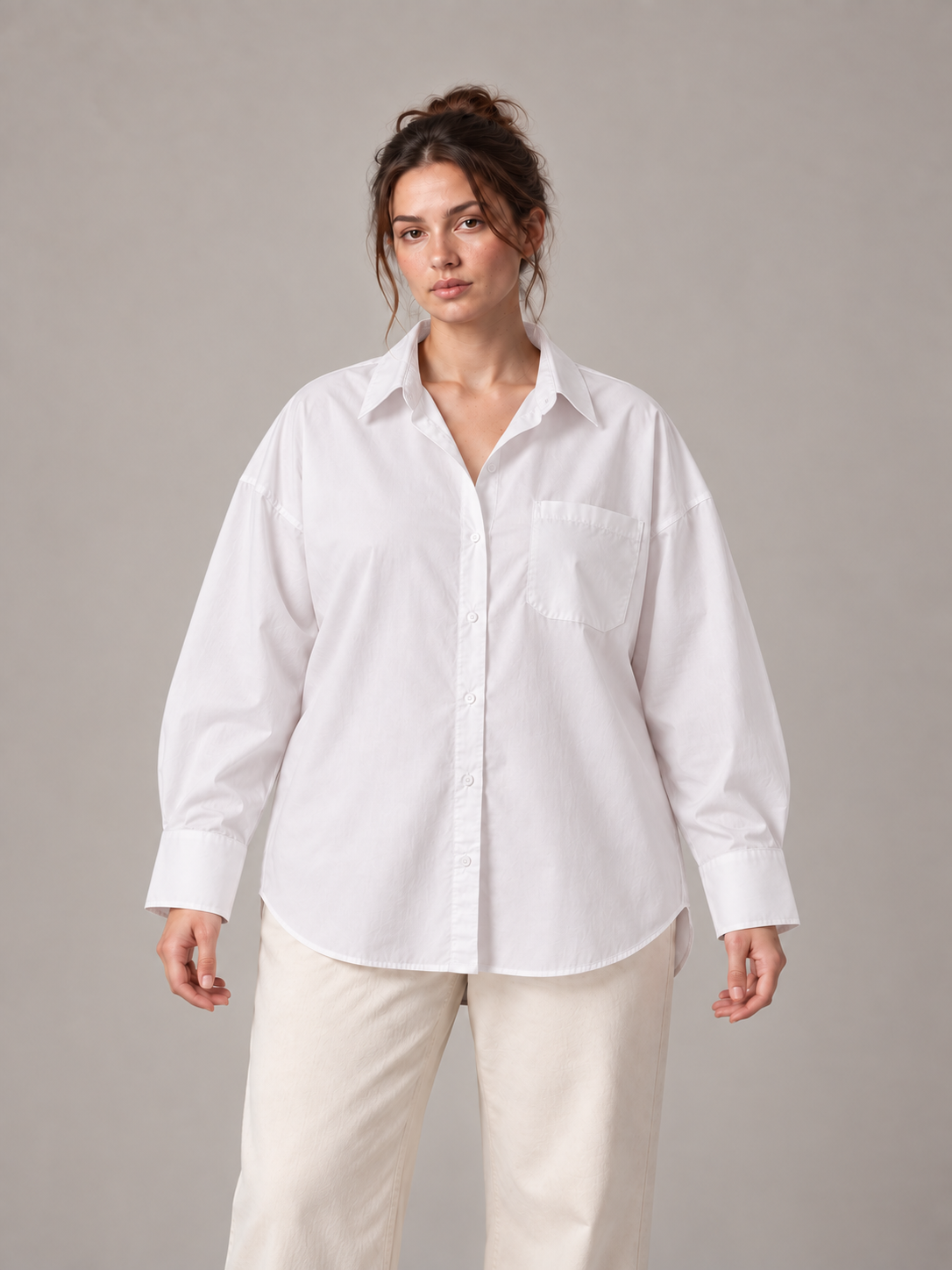 White Curve button-up shirt on an adult model, front view; Curve size range 0XL–4XL.