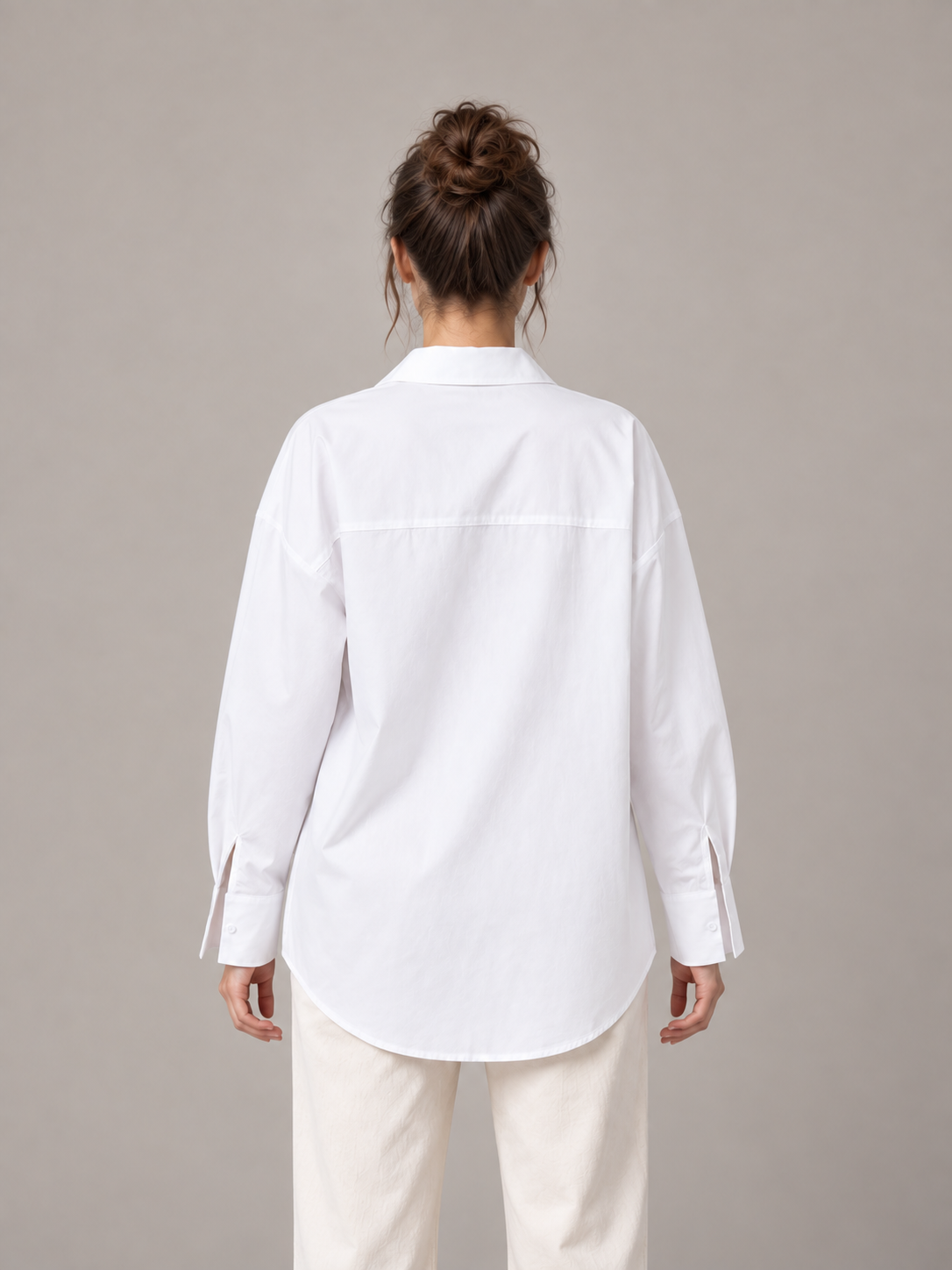 White oversized button-up shirt, model back