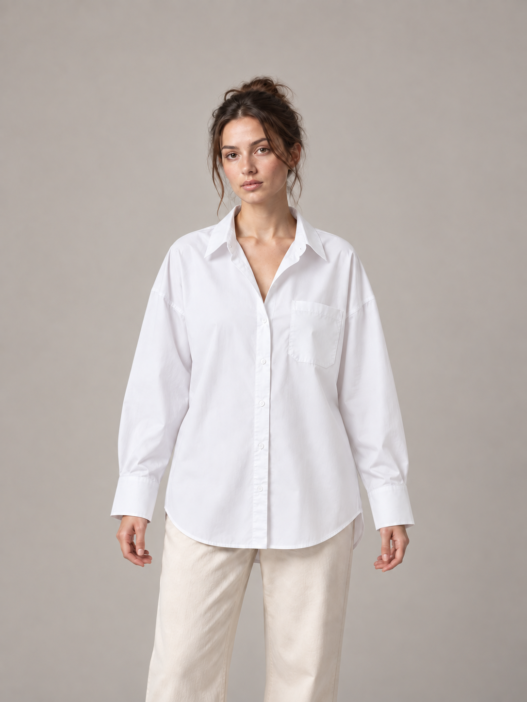 White oversized button-up shirt, model front