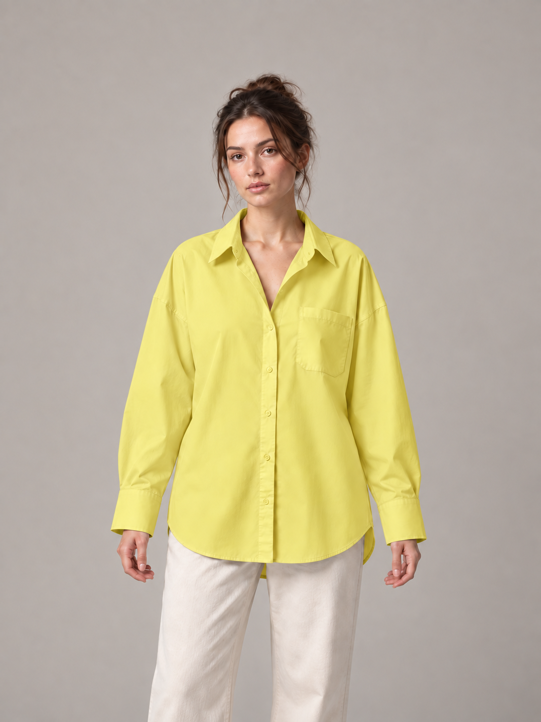 Yellow oversized button-up shirt, model front