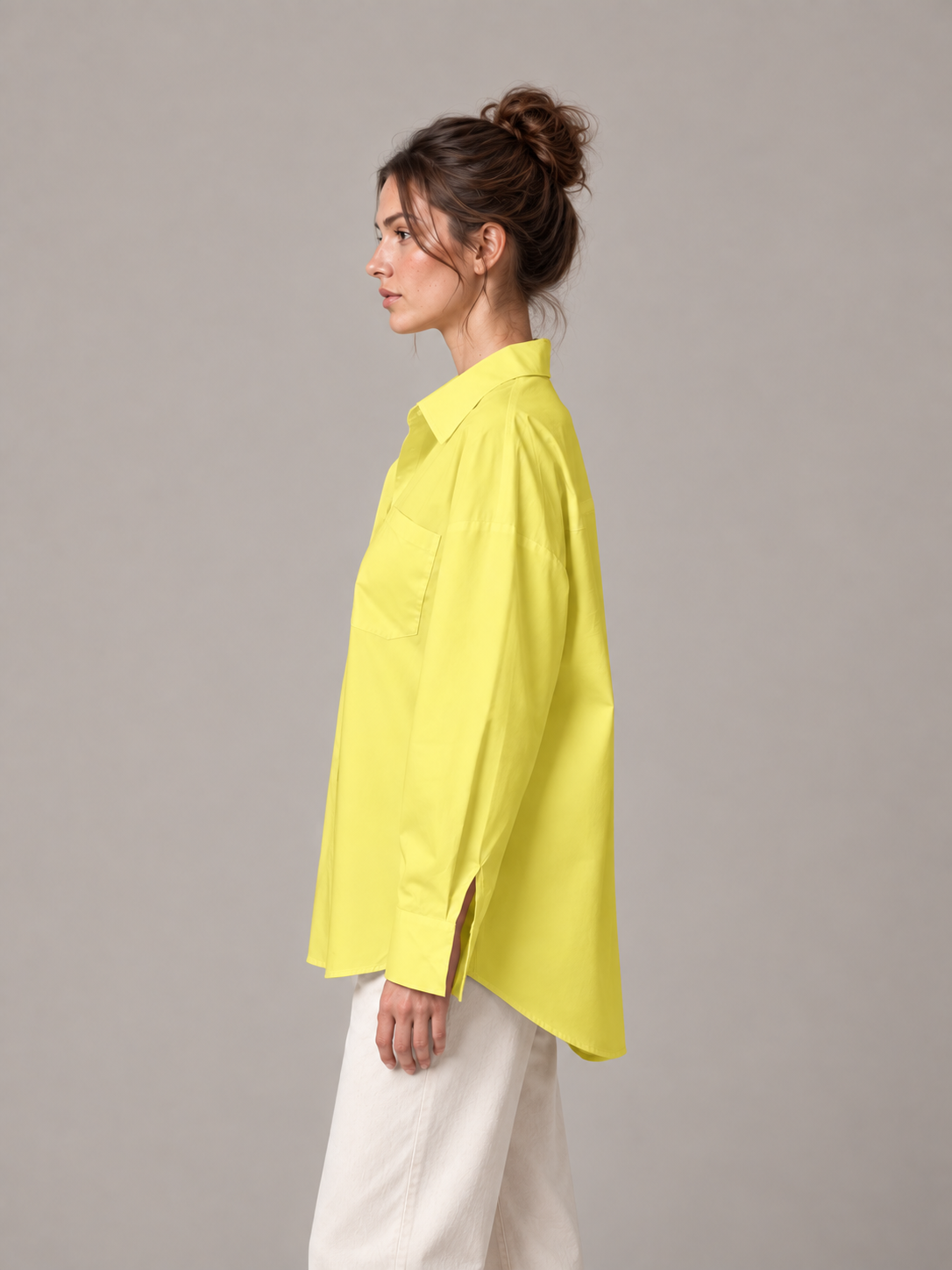Yellow oversized button-up shirt, model side